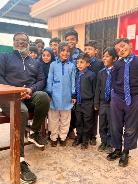Pastor Victor Sammuel with a group of students